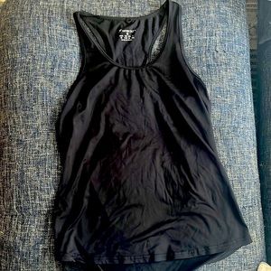 Women’s black razorback tank top. Long. Never worn. Size xs.